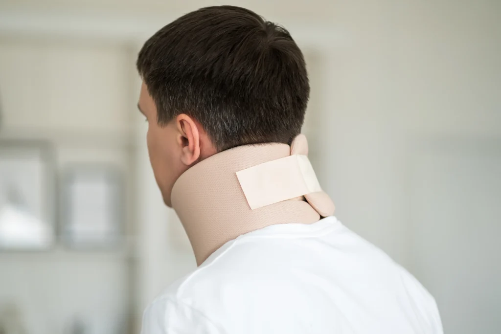 A person wearing a neck brace.