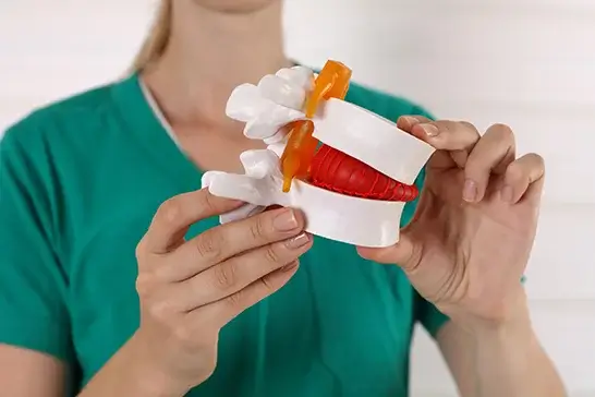 A nurse showing the disceel procedure.